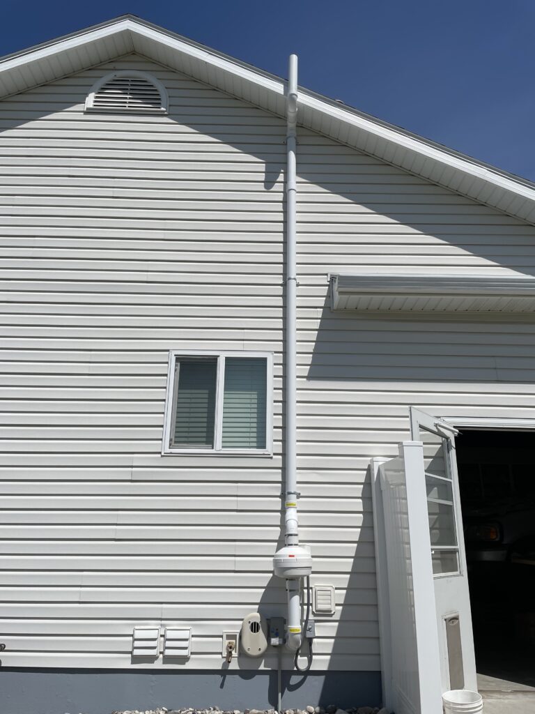 After: Exterior radon system with venting
