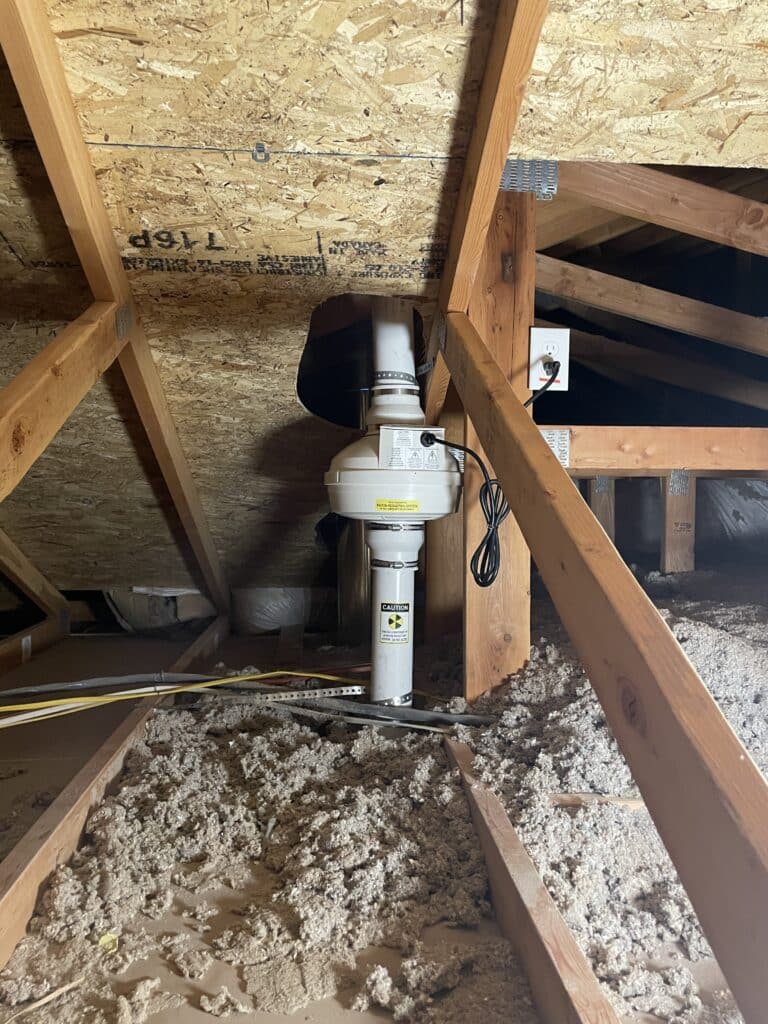 Radon system in attic