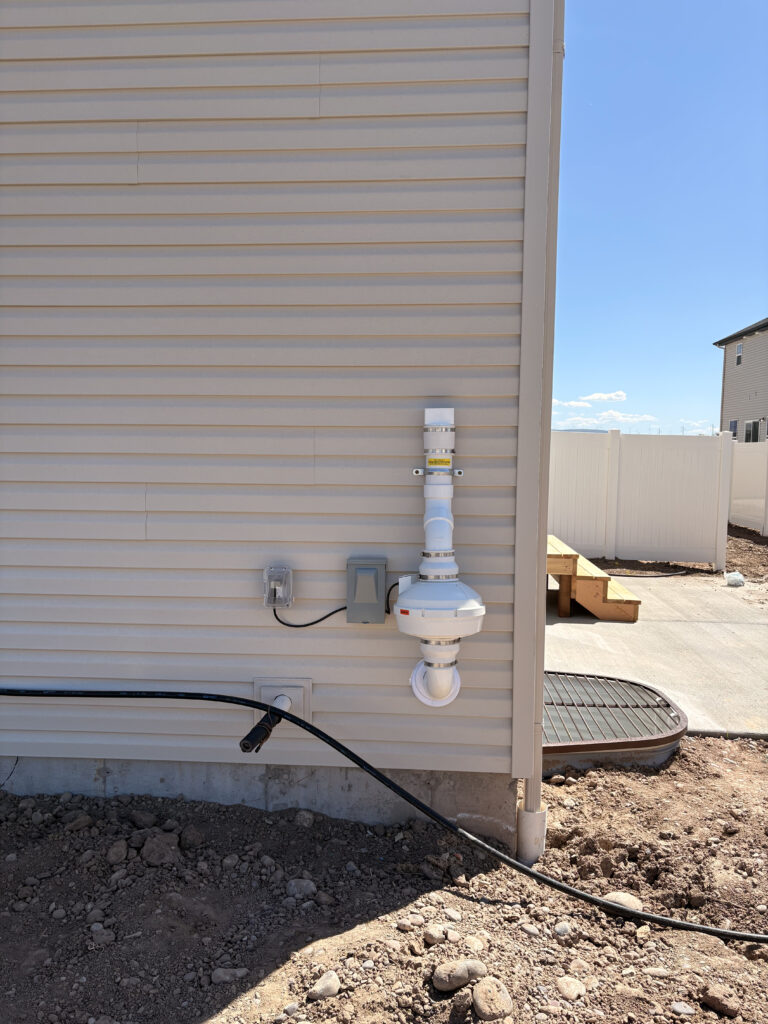 Before: Exterior radon system without venting