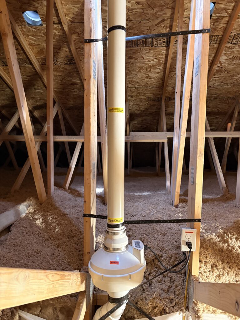 Radon system in attic