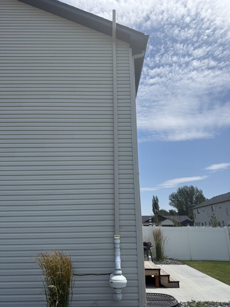 After: Exterior radon system with venting